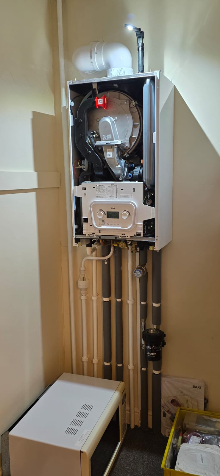 A-Select engineer working on a boiler installation